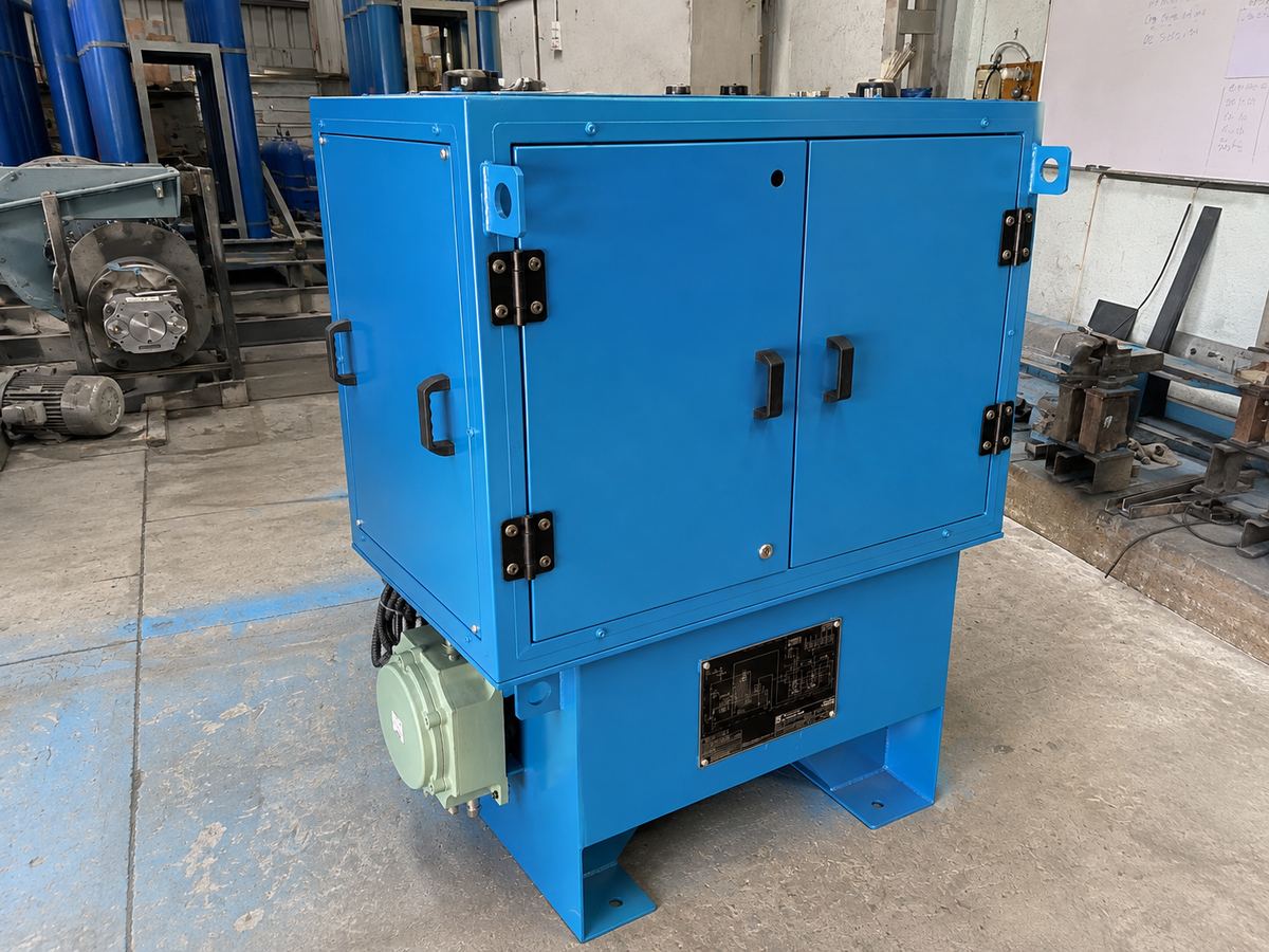 Enclosed machine tool hydraulic power unit in blue cabinet